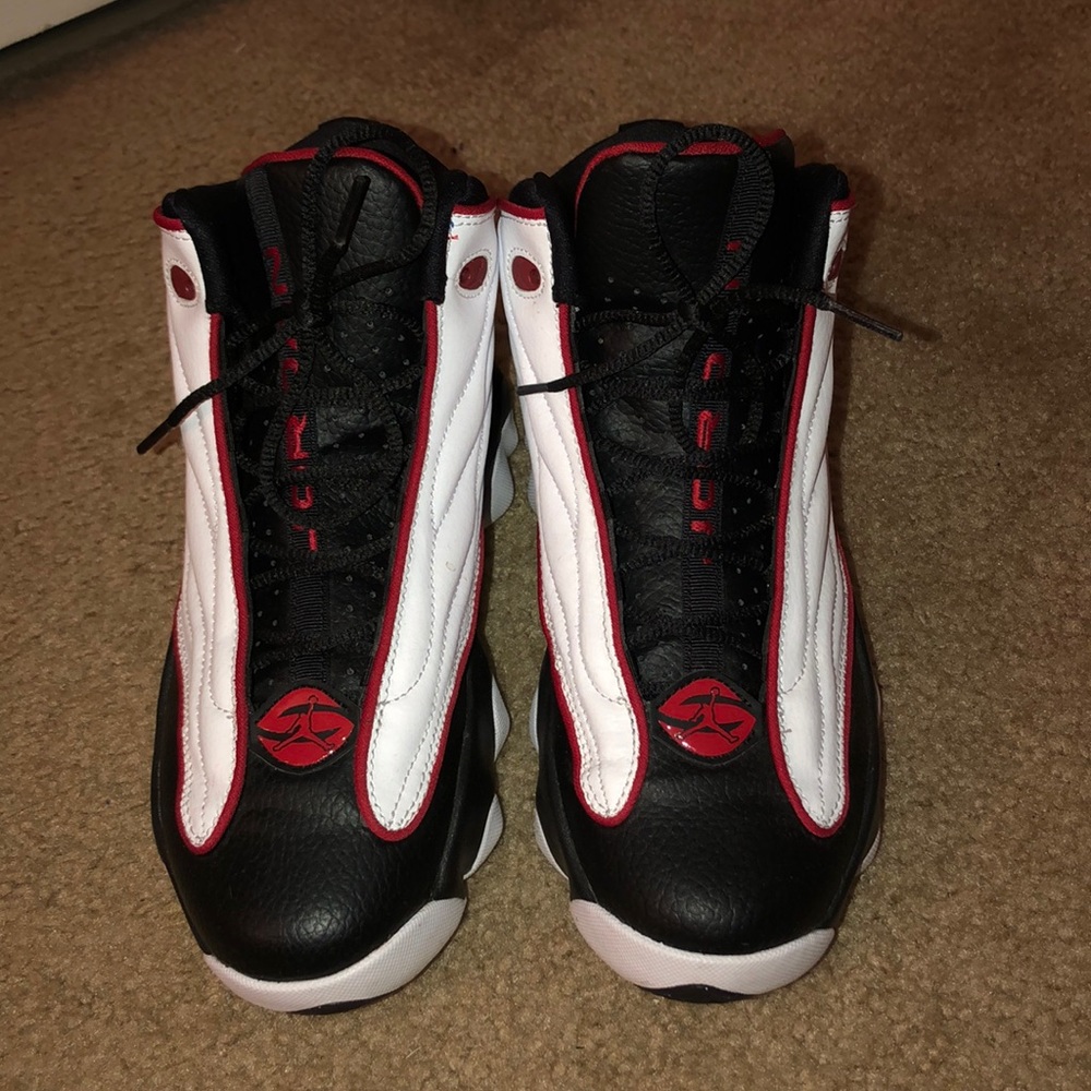 Black white and red Jordan sneakers